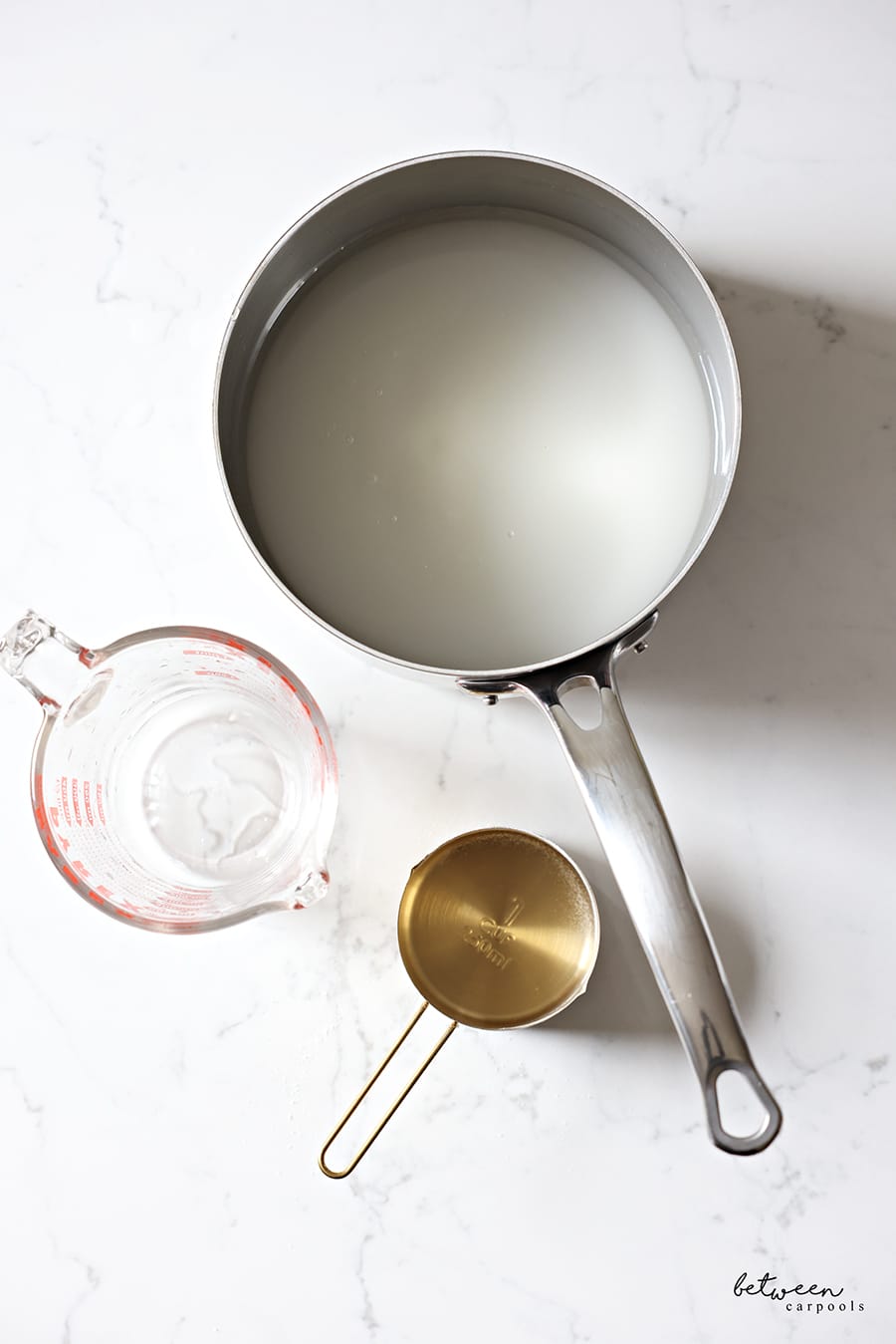 equal amounts of sugar and water in a pot. to make simple syrup