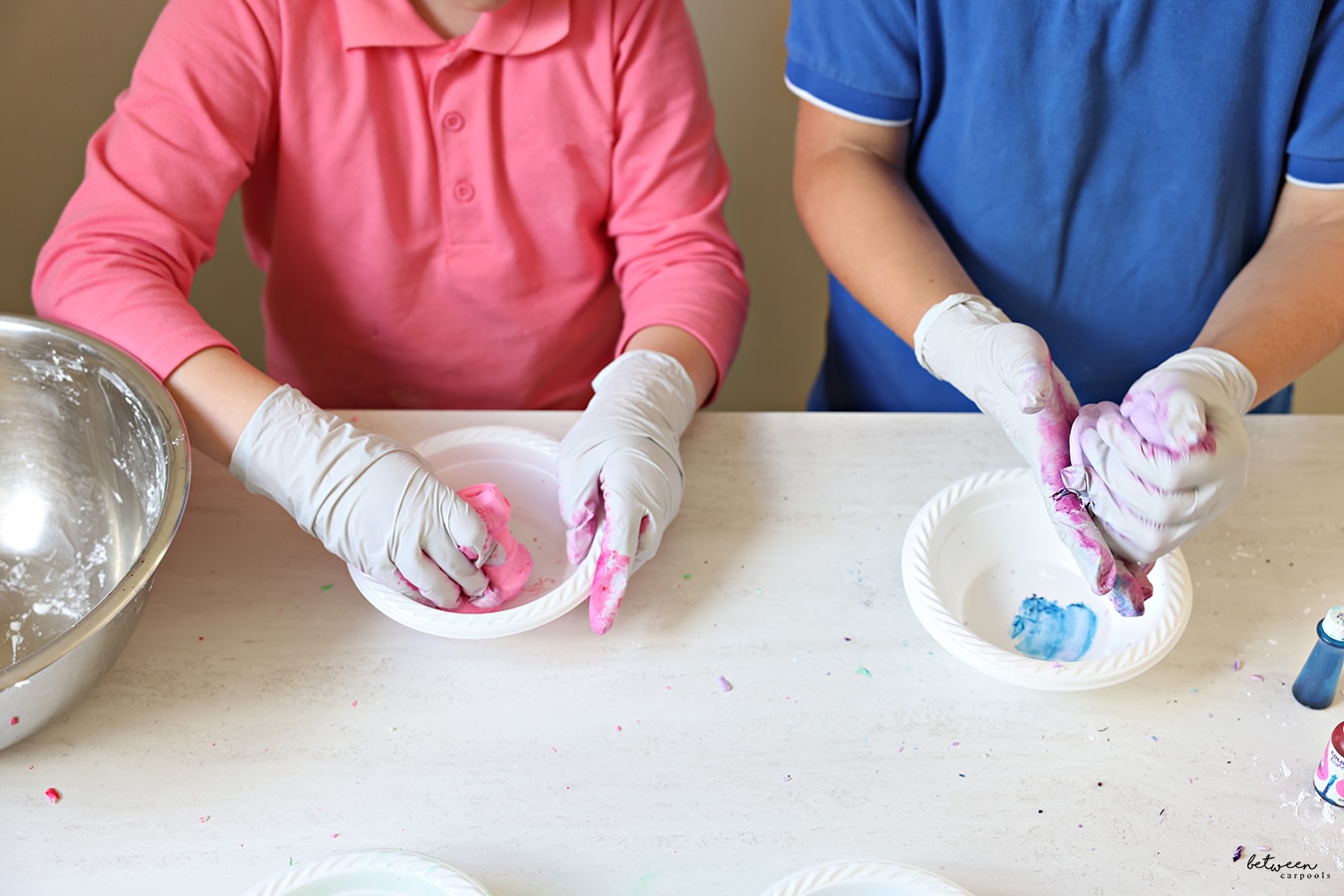Kids playing with homemade Play-Doh (with gloved hands)