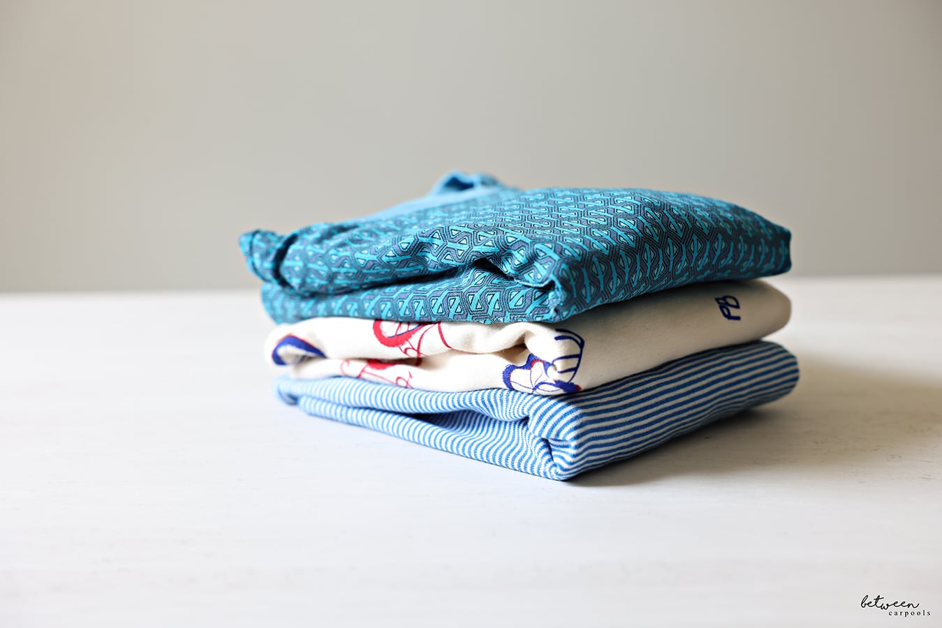 folded pajamas in a pile