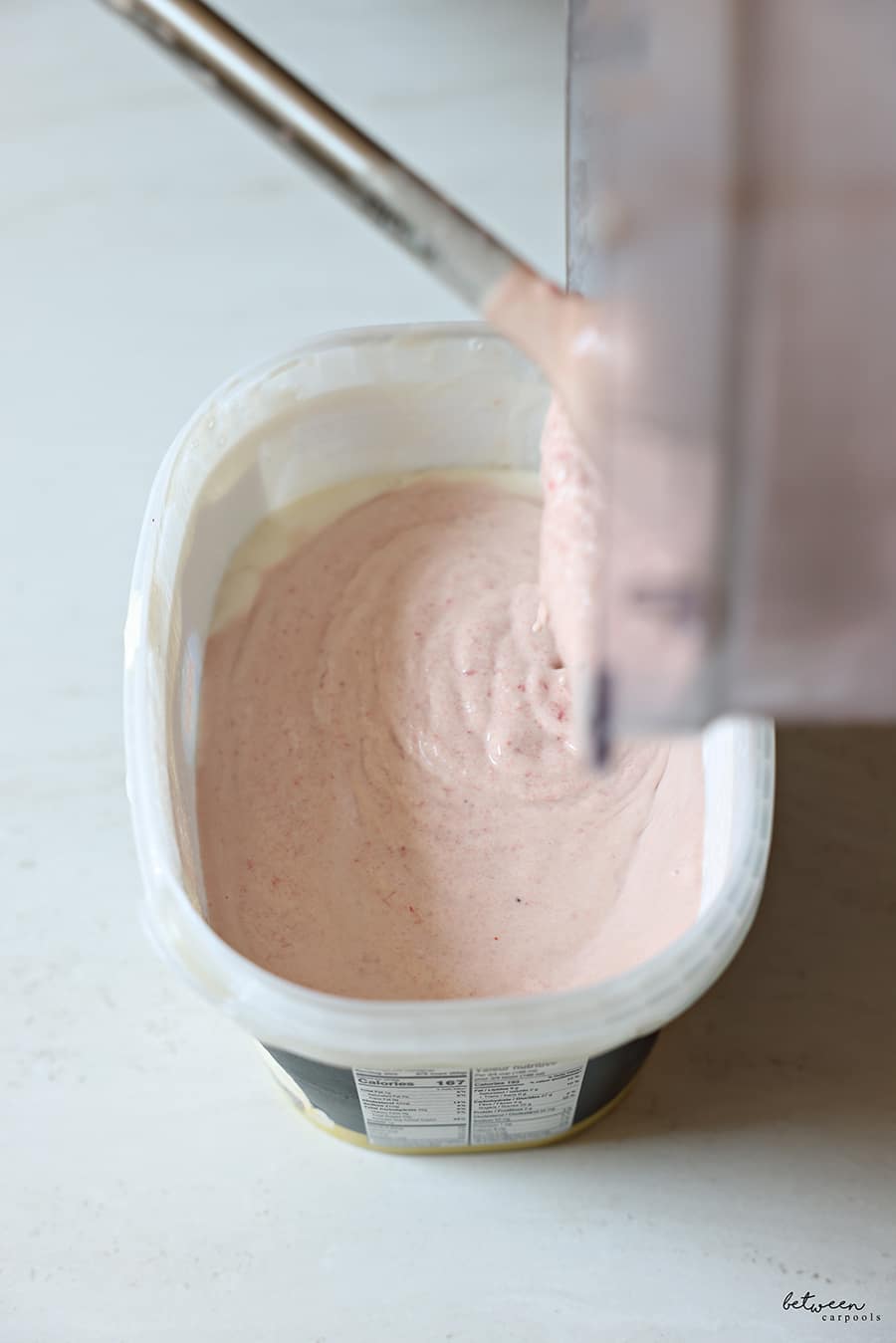 Homemade ice cream back into the vanilla ice cream carton