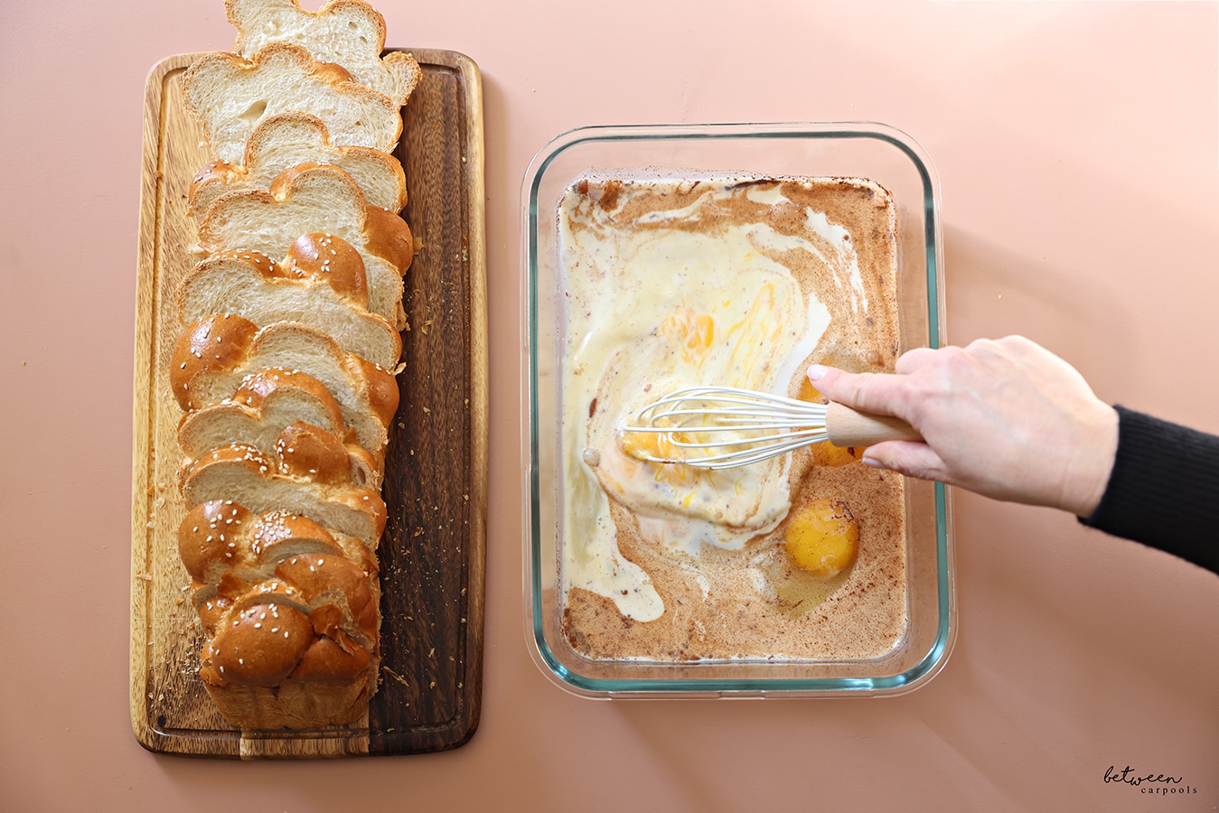 Whisking French toast batter in a glass dish.