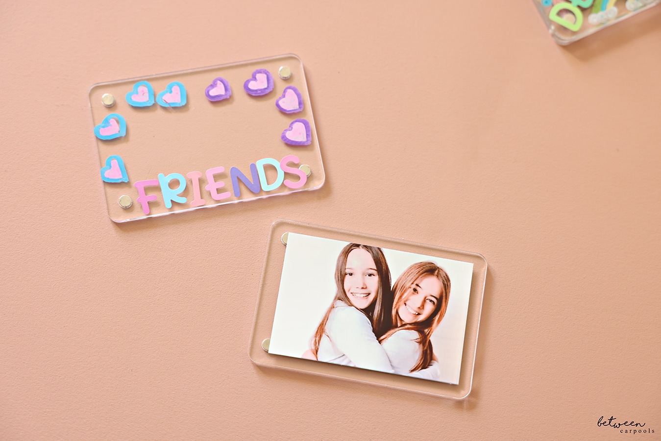 A decorated acrylic frame with a printed photo.