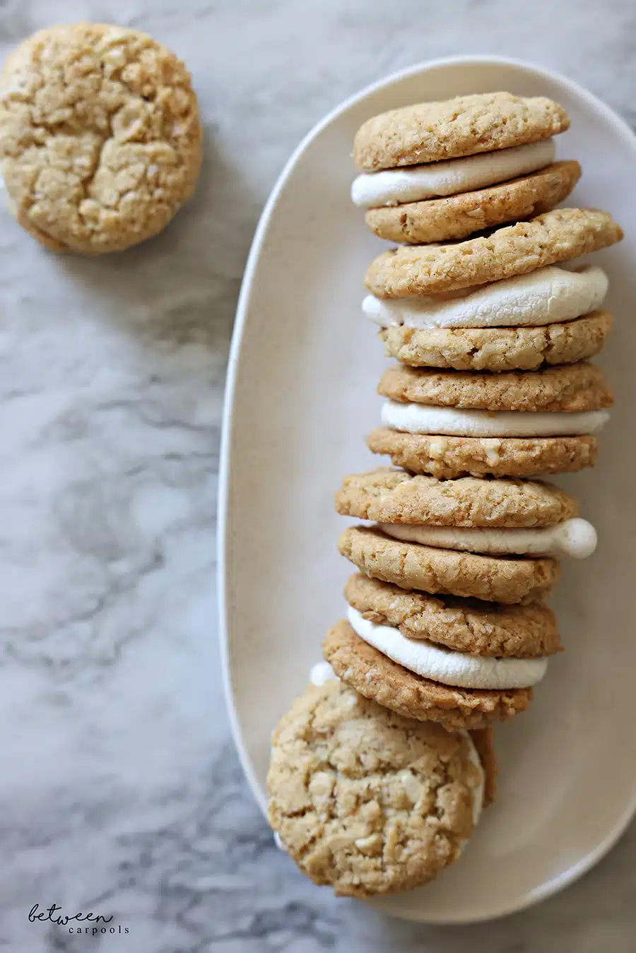 Toasted Marshmallow Sandwich Cookies on a white oval tray.