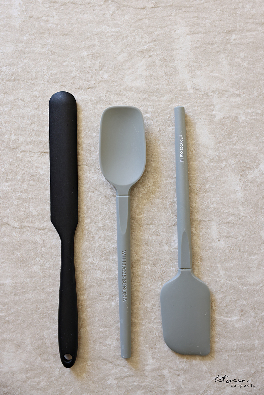 One Black Jar Spatula and a Set of 2 Williams Sonoma Flex Core Mini Spatulas in Grey.
