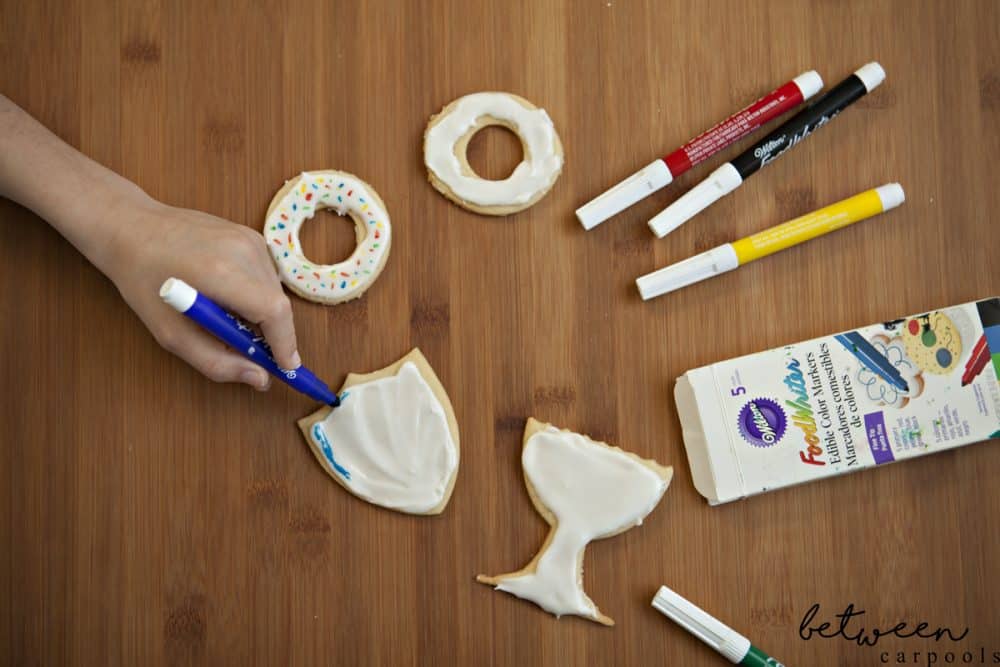 Make your own cookies that you can color on. Color on cookies is a great idea for Chanukah party activity