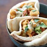 Breaded Cauliflower Florets in pita with Israeli salad and techina.