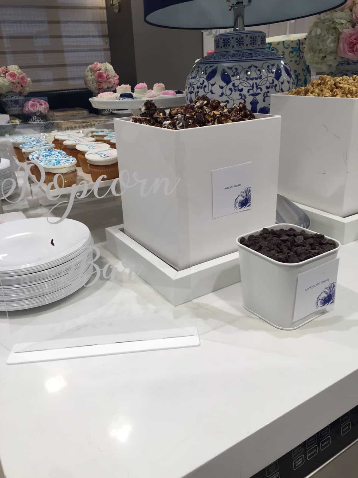 What’s the Newest Fun Idea for Your Party? A Popcorn Bar. Sure, there’s lots of desserts, donuts of course, and a salad bar and sushi bar. But the latest, most fun element of the sweet table is the Popcorn Bar.