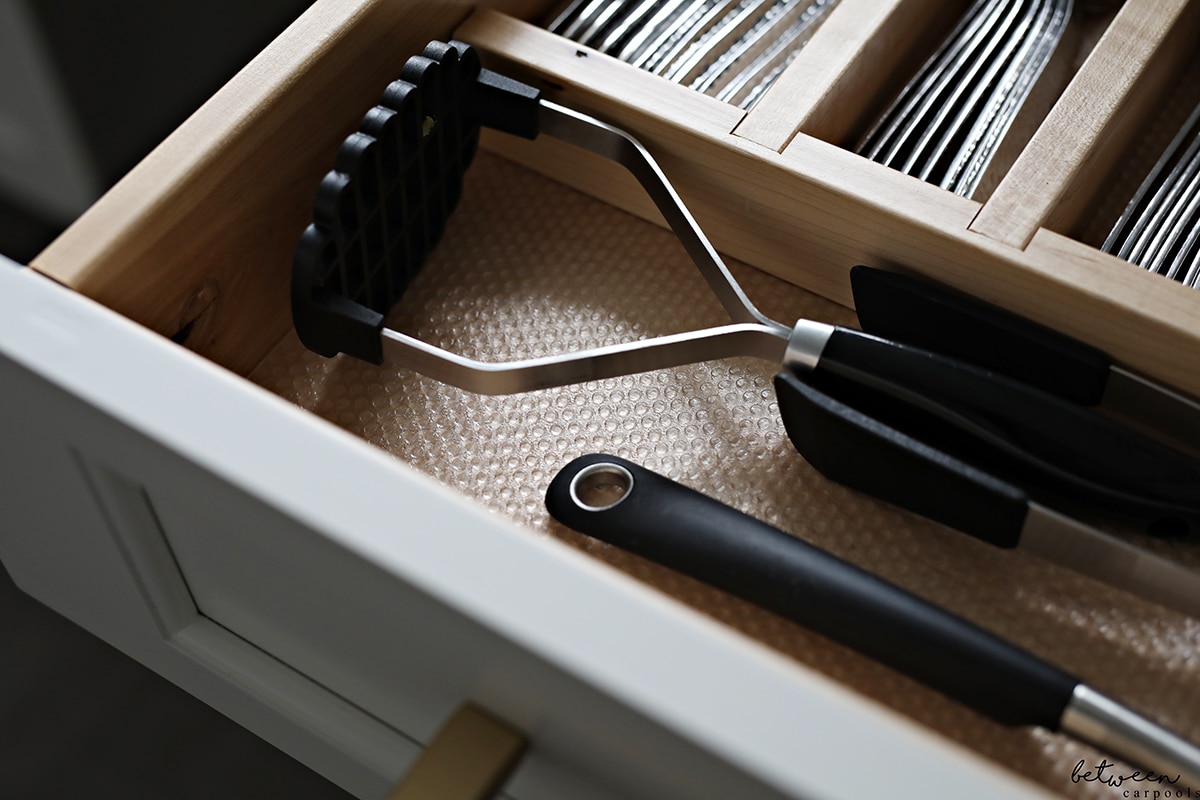 IKEA 365+ kitchen utensils in a cutlery drawer lined with VARIERA
Drawer liner
