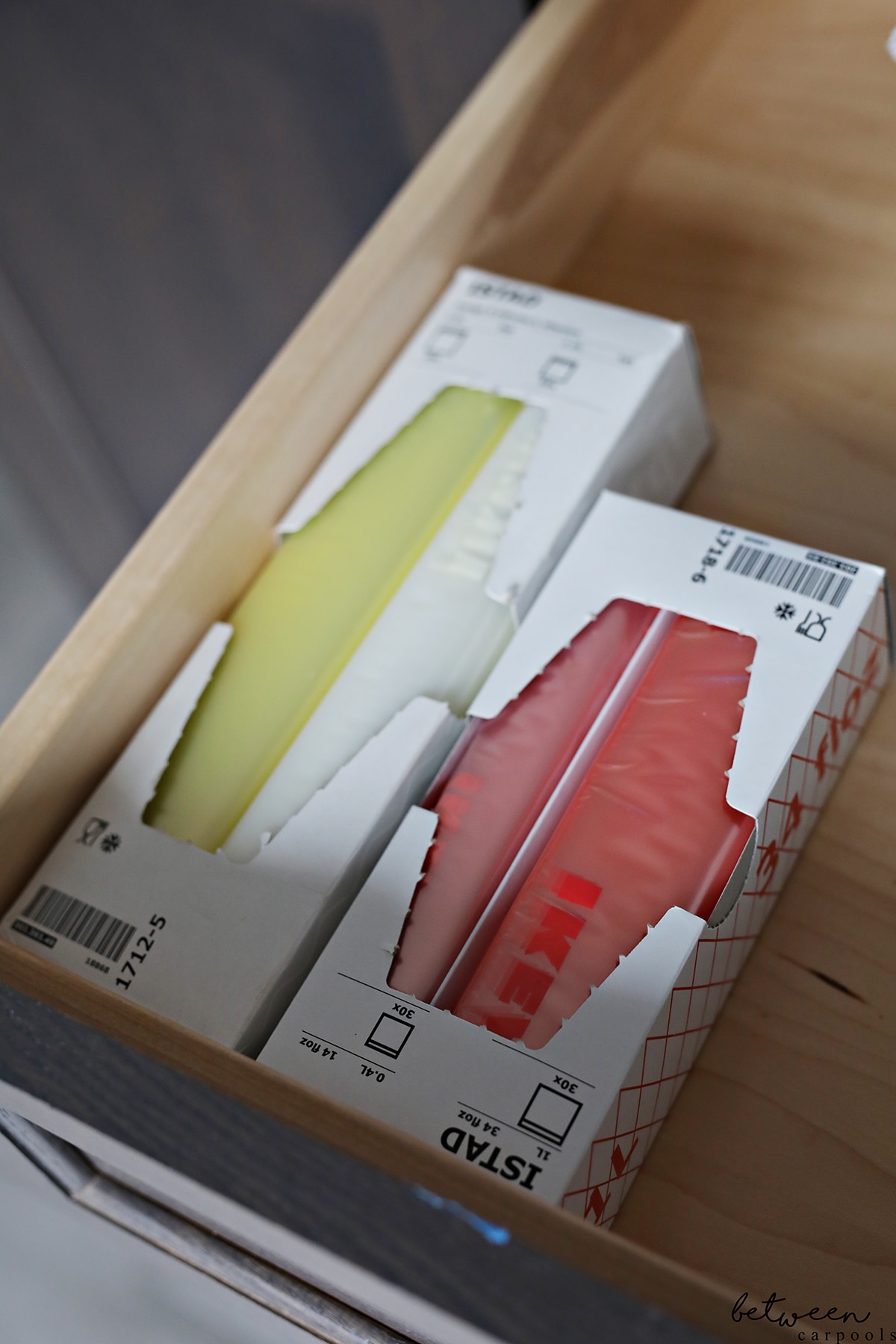 2 boxes of Ikea ISTAD Resealable bags in a kitchen drawer.