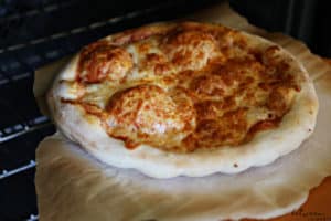 How to Stretch Your Pizza Dough into a Large Round Pie