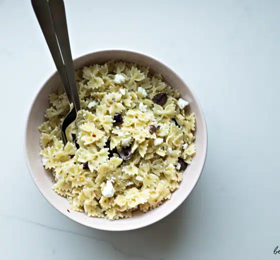 Bowl of Mediterranean pasta salad, dairy version.