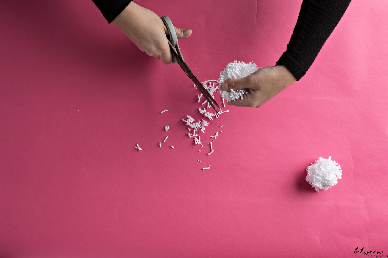 How to Make Your Own Pom Poms. It’s easy to make your own pom poms to adorn any costume using simply a scissor and yarn.
