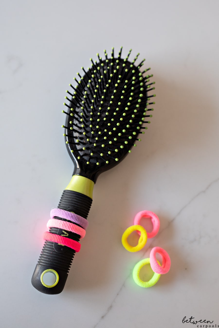 This is Really the Best Place to Keep the Hairbrush and Ponytails. Do you scramble to do your girls’ hair while the bus is about to arrive and they’re still eating breakfast?