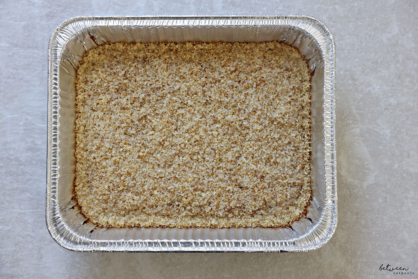 Quino baked in the oven, in a 9 x 13 aluminum foil pan.