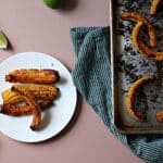 Roasted corn riblets on a baking sheet and plated.