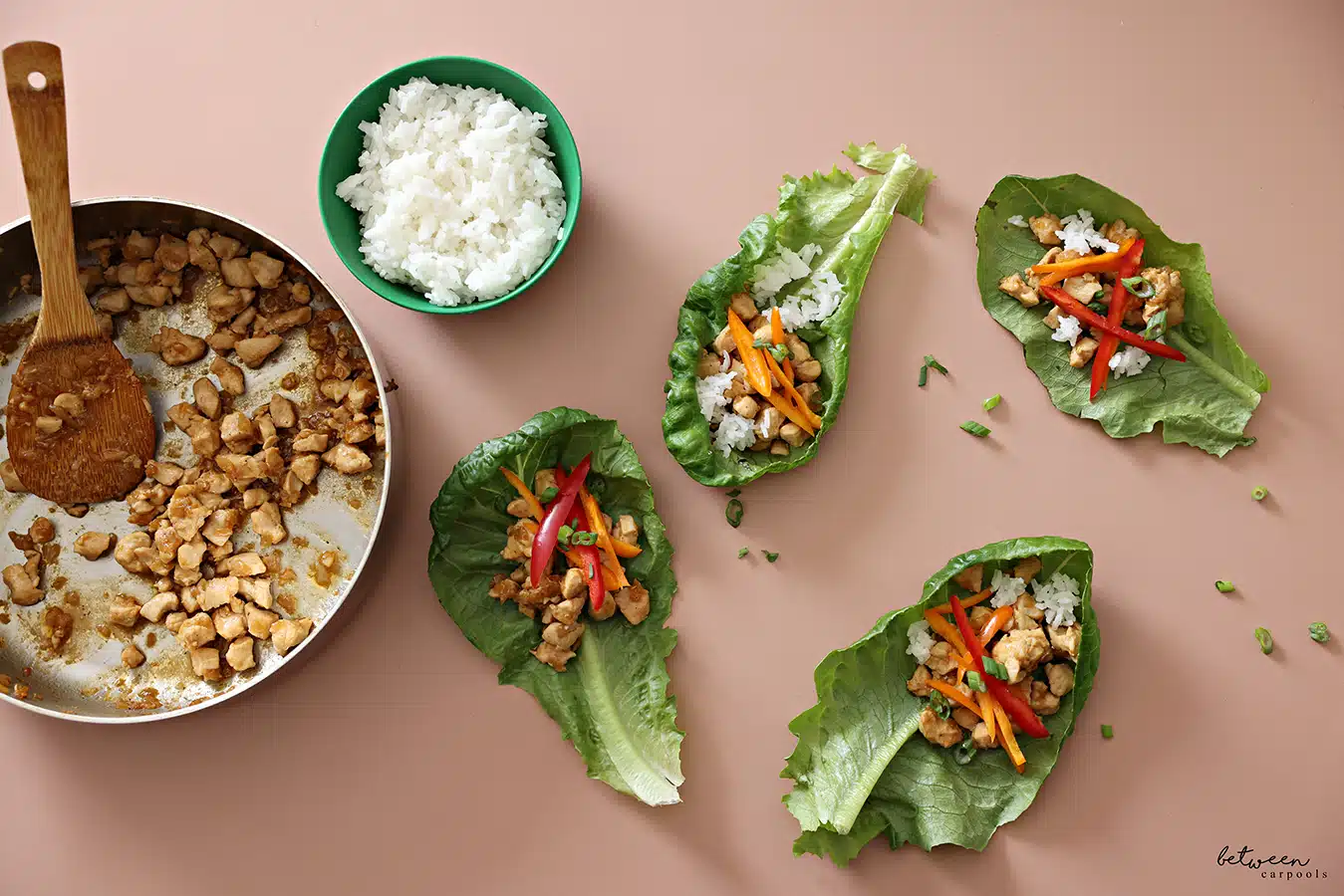 Crunchy Chicken Lettuce Tacos on pink background