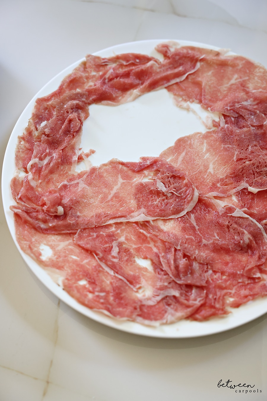 carpaccio on a plate, almost full