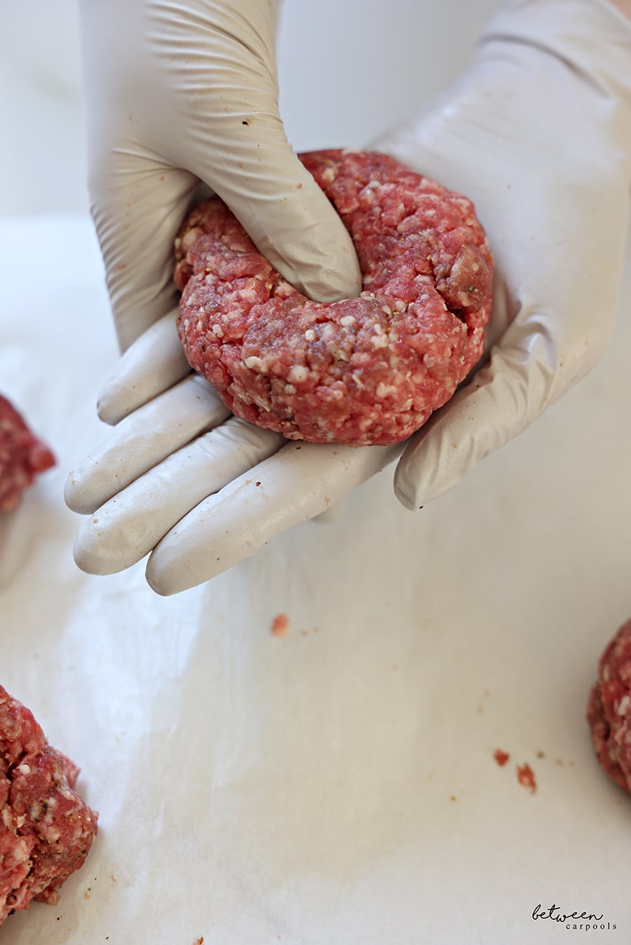 creating a dip in the center of a burger (with your thumb)