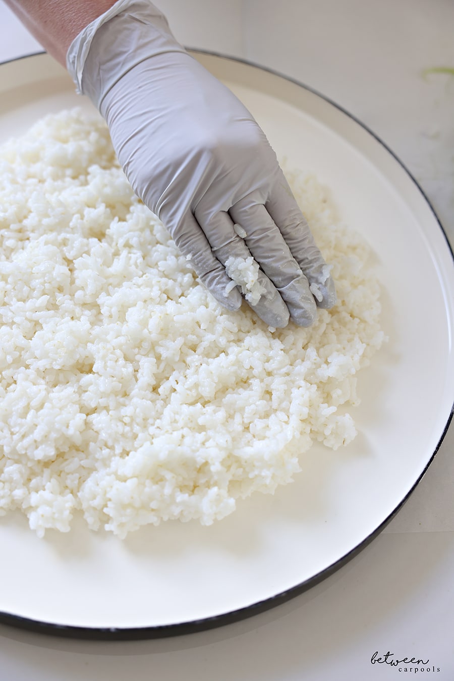 sushi rice on a large round platter