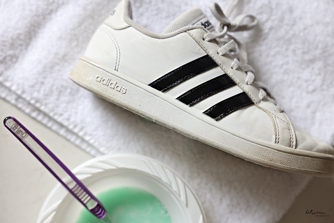 Dirty soles of adidas girls sneaker