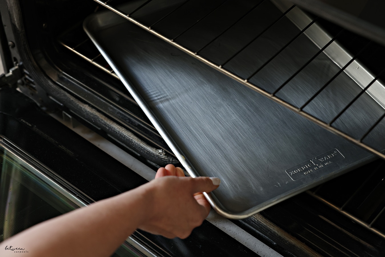 Adding a baking sheet with water to the bottom rack