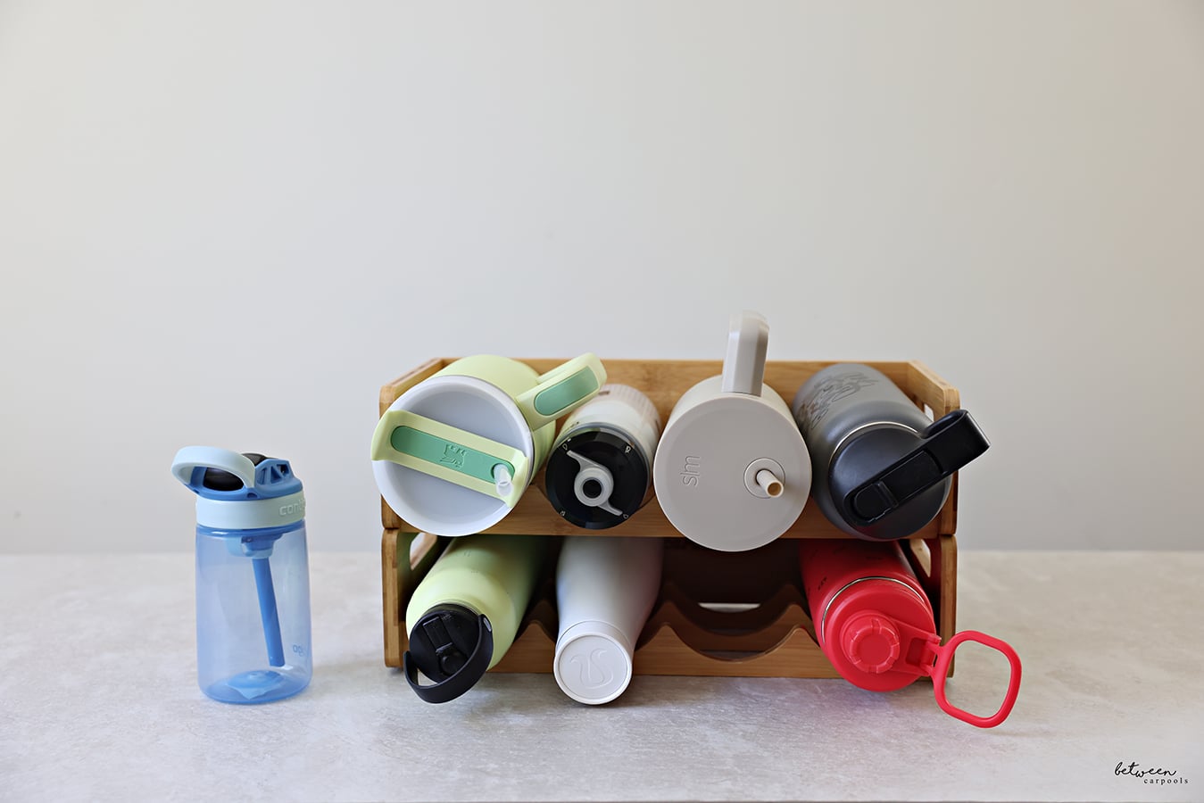 all water bottles on an organizer. contigo kids on the side