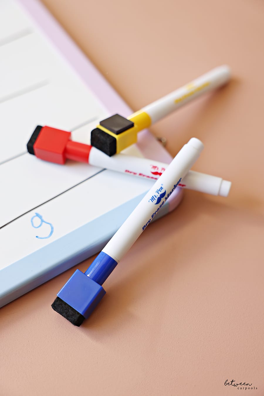 closeup of whiteboard and dry erase markers