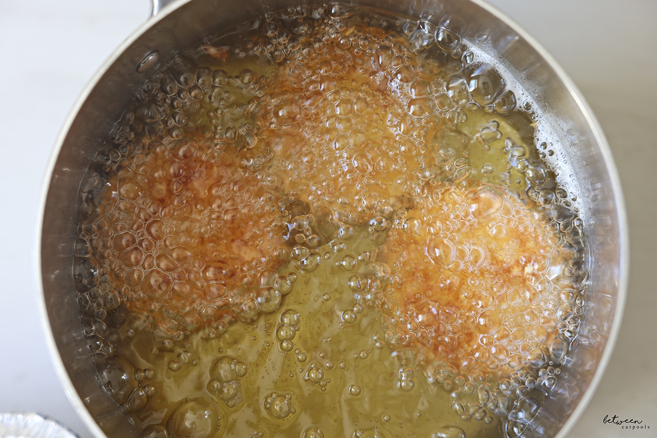 Frying breaded rice cakes.