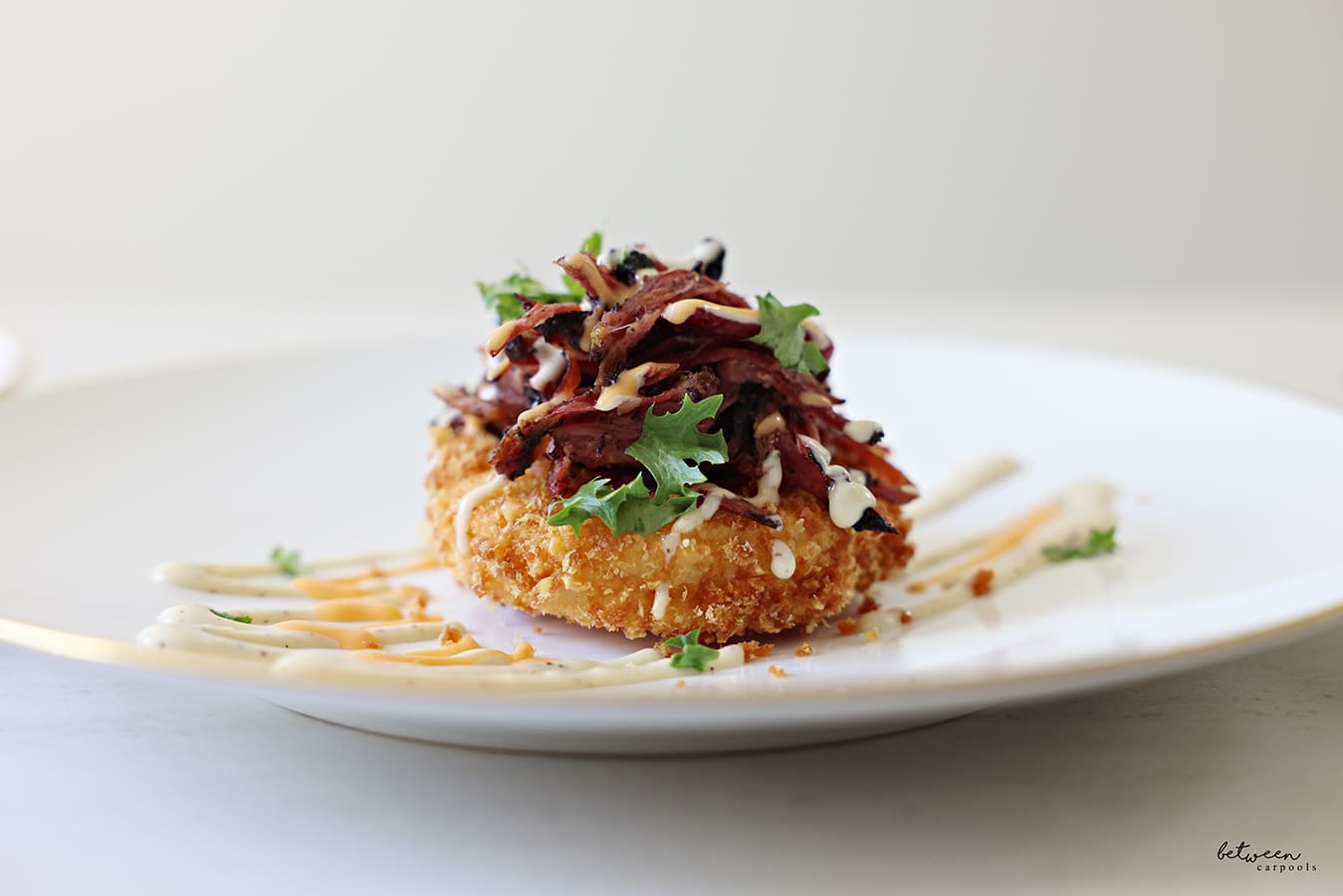 Pulled beef topped rice cake