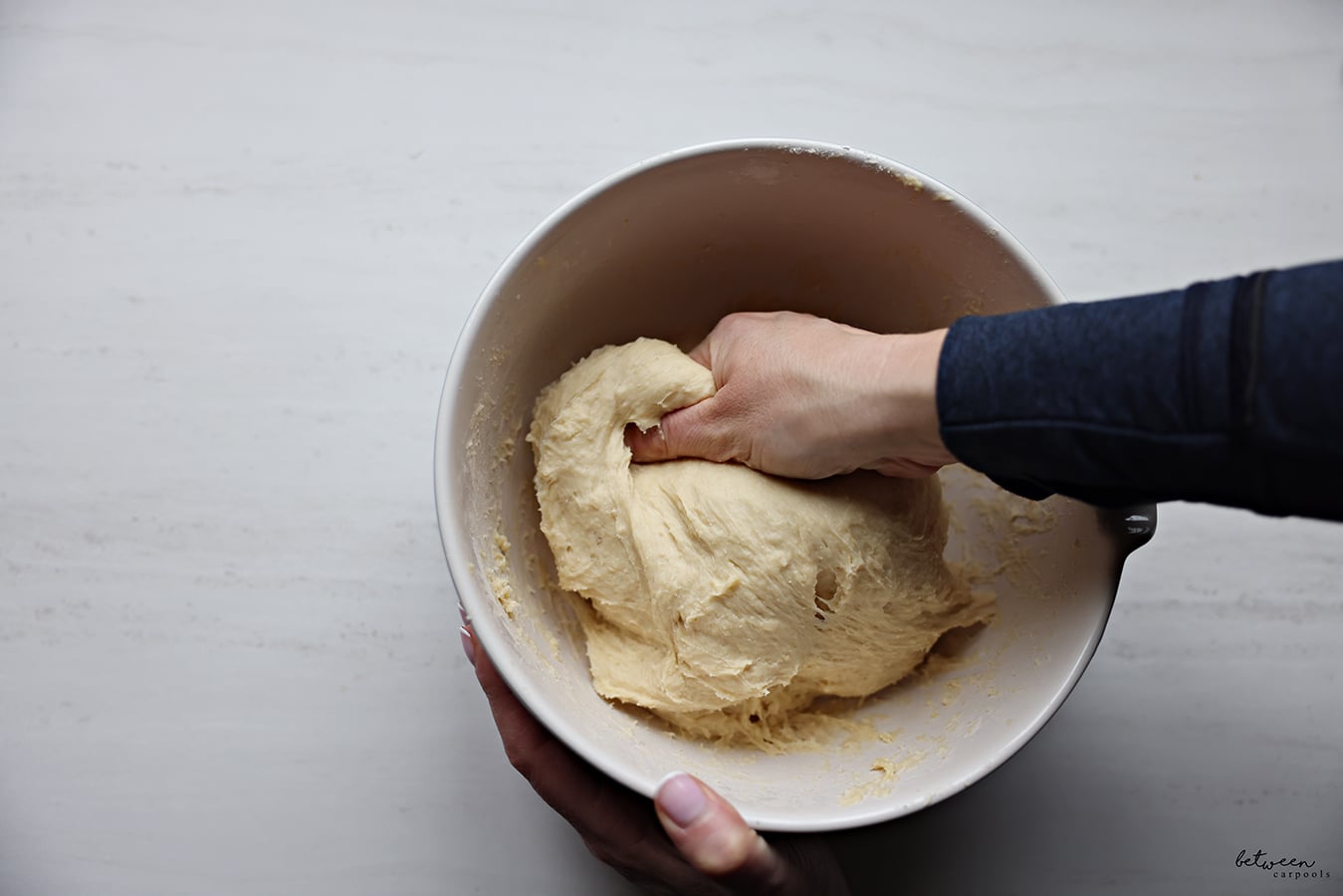 Kneading the dough - in the bowl - by hand.