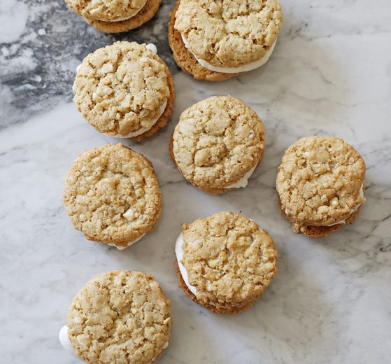 Toasted Marshmallow Sandwich Cookies on stone - overhead view