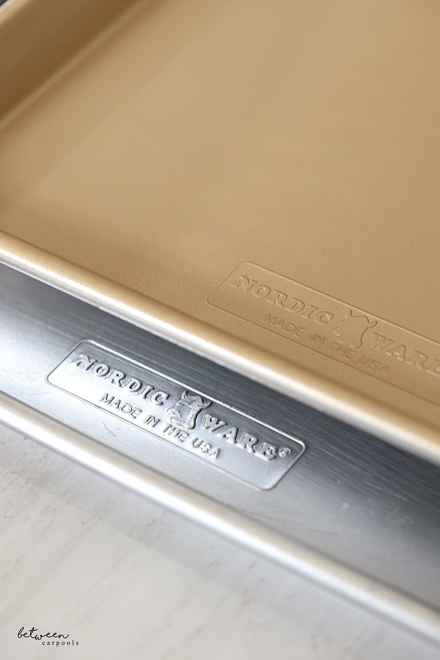 Nordic Ware Naturals Nonstick Half Sheet - one stainless and one gold