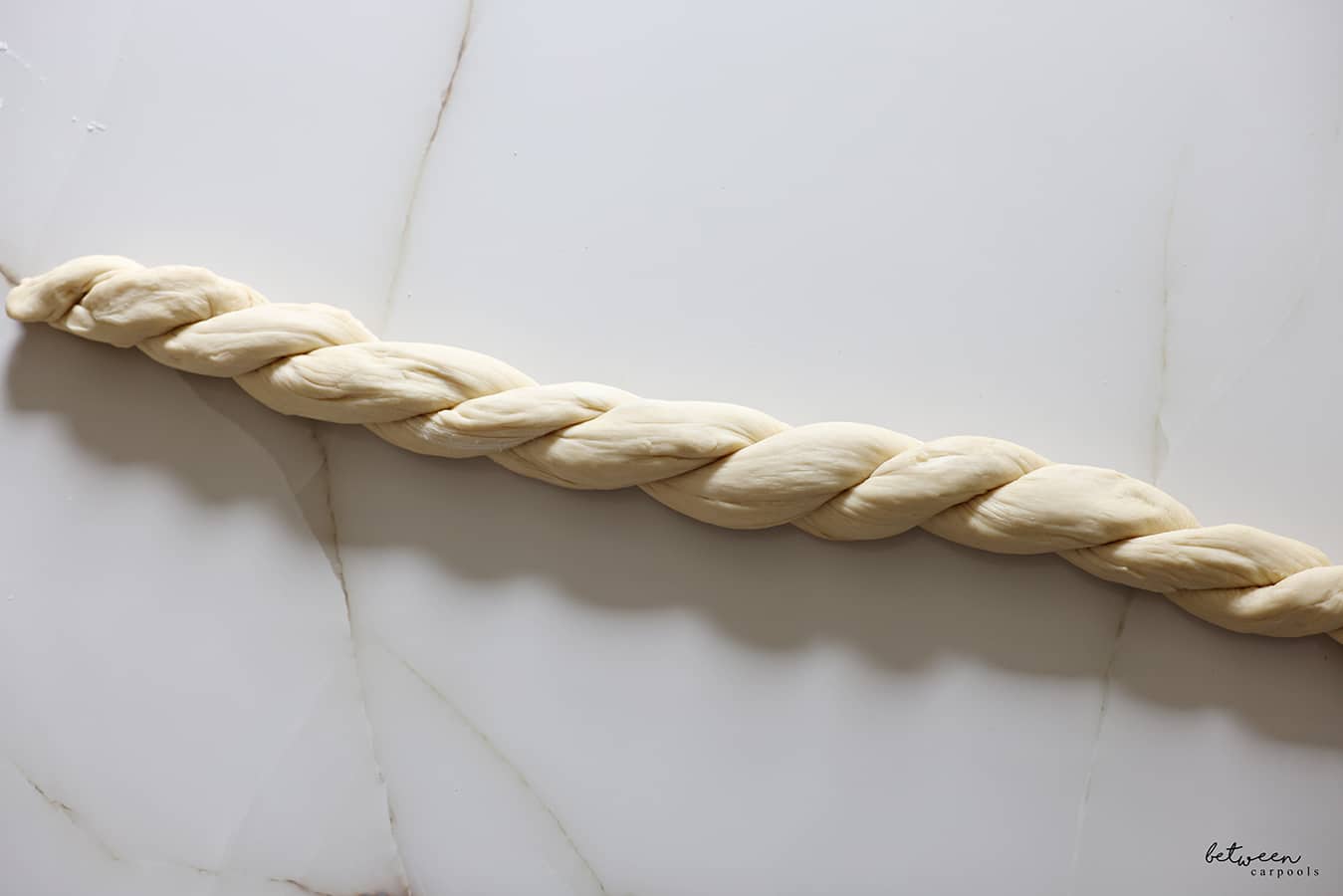 One long twist - made by twisting two longs strands of challah dough.