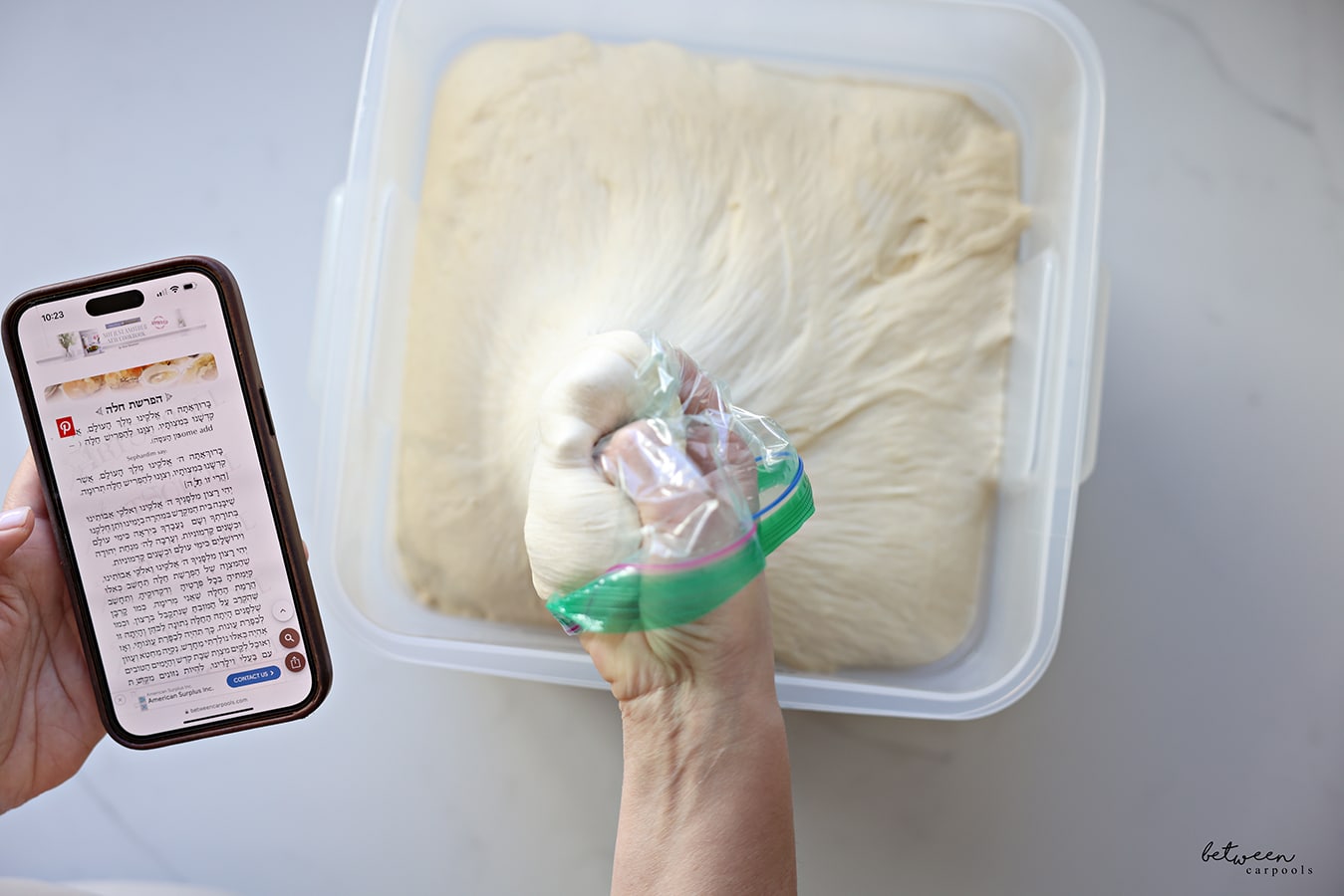 Taking challah from challah dough in a Cambro 12 qt. food storage container.