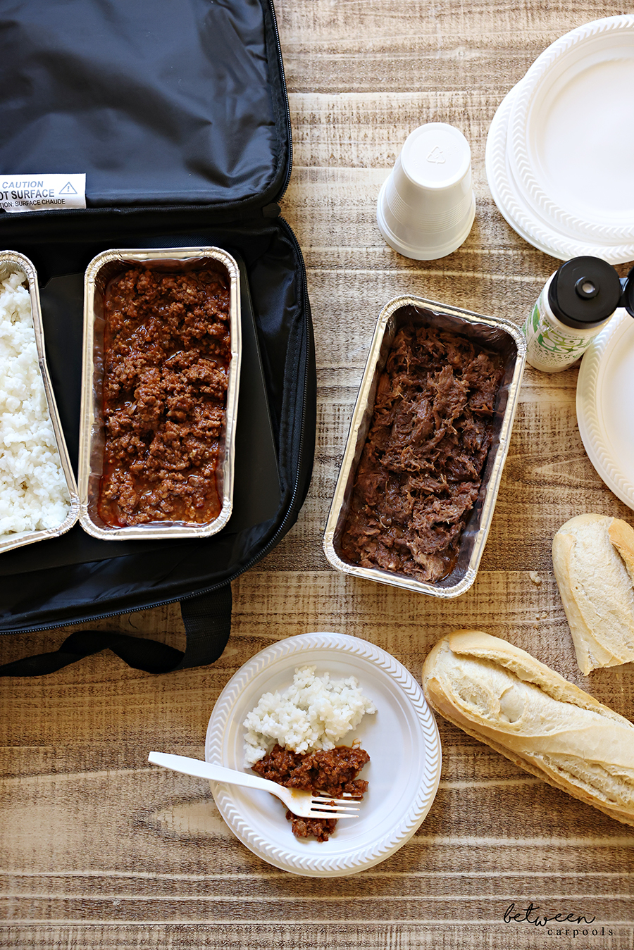 Plated dinner, chili, shredded beef, rice, baguettes and condiments, with a HOTLOGIC. Open, Top View.