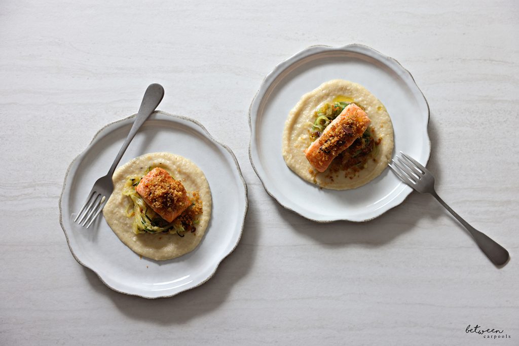 Panko topped salmon over zoodles and eggplant puree.