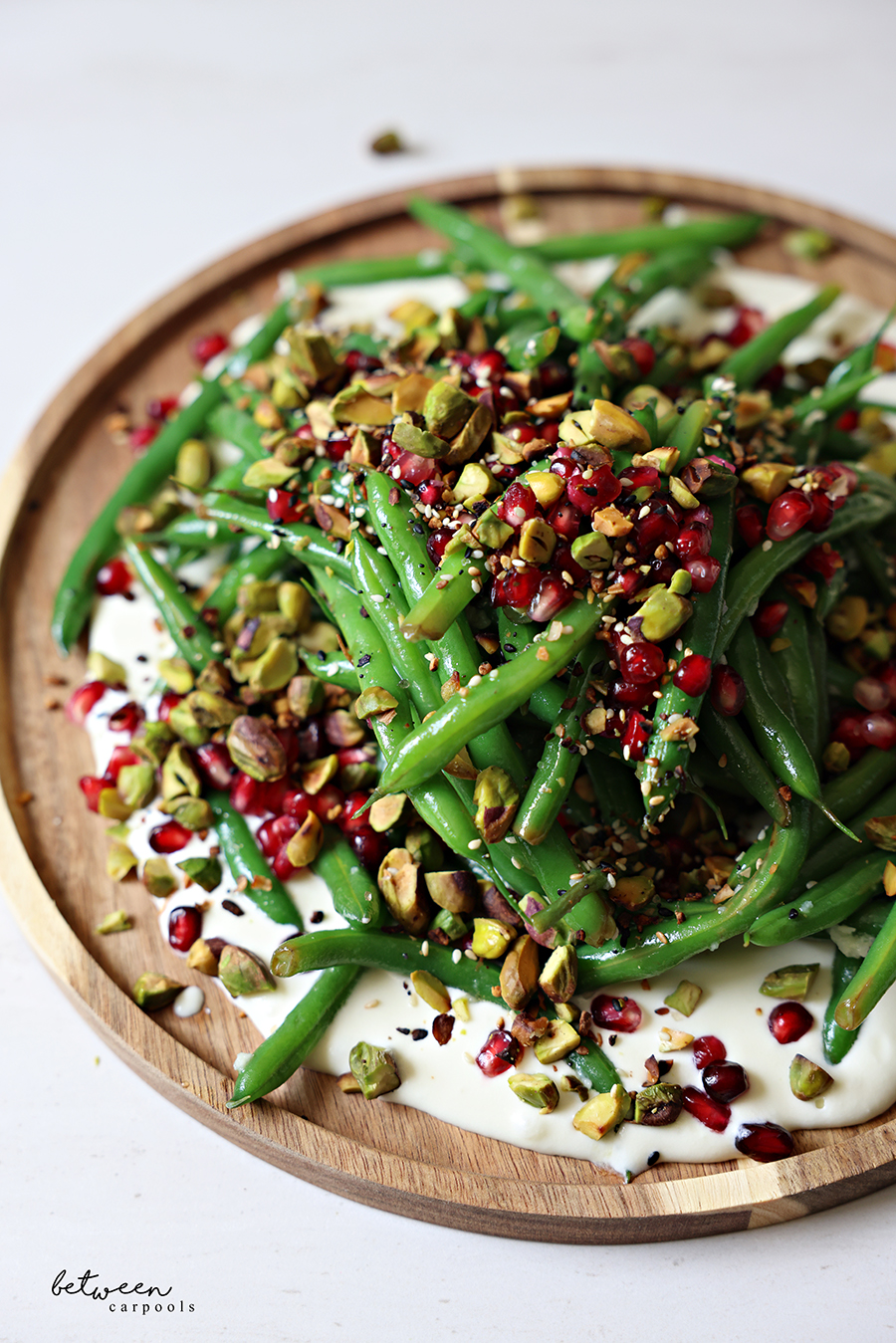 green bean & pomegranate chopped salad with feta dressing Green beans, bulgur, feta and pomegranate