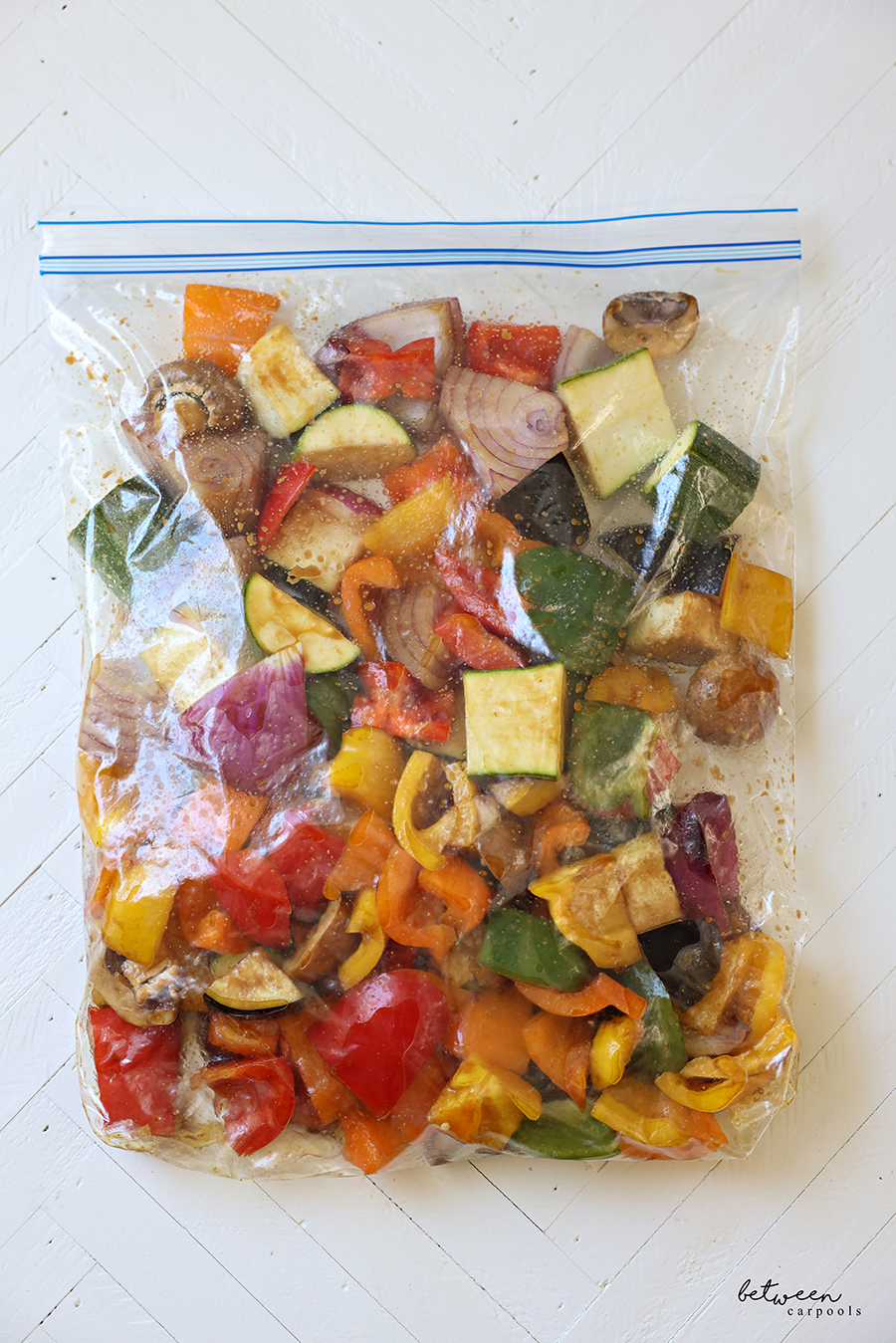 Large diced vegetables + marinade in a Ziploc bag.