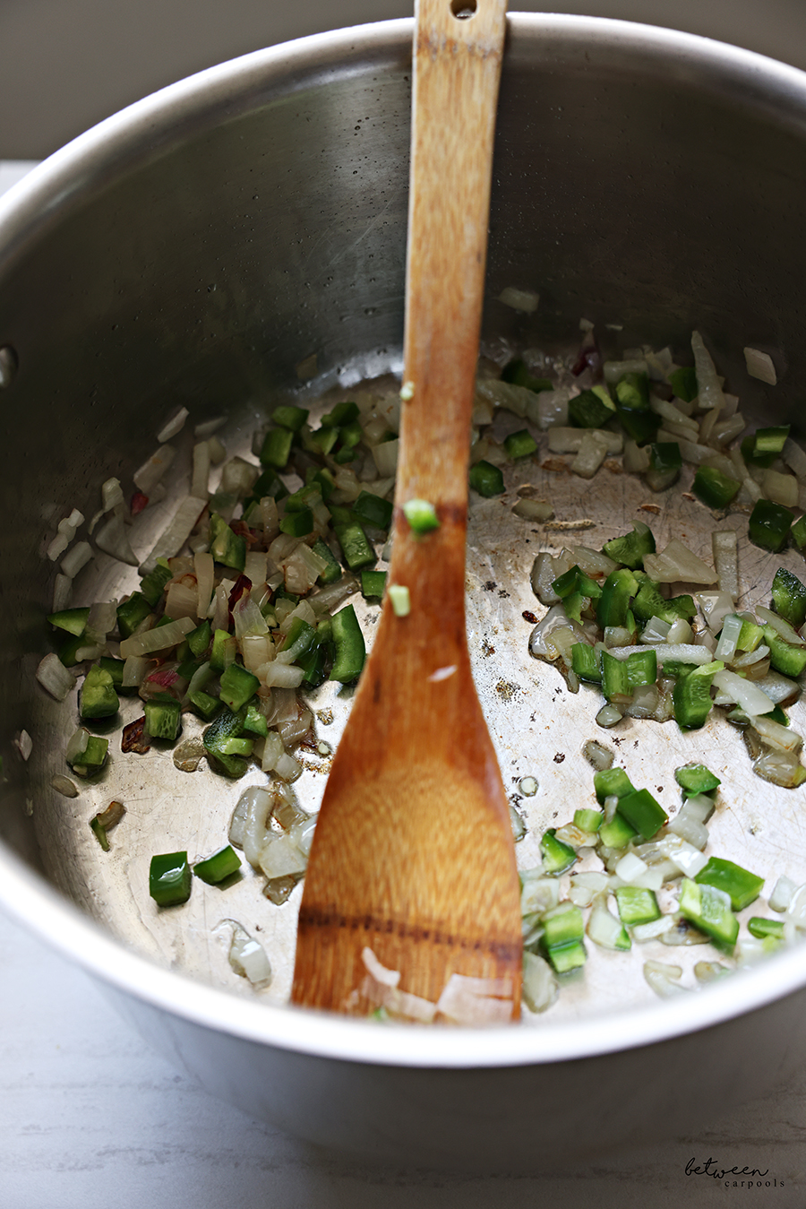 Finely diced shallot and jalapẽno a sauté pan.