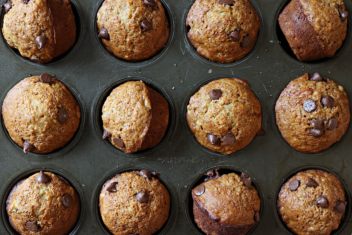 Closeup of freshly baked chocolate chip banana muffins.