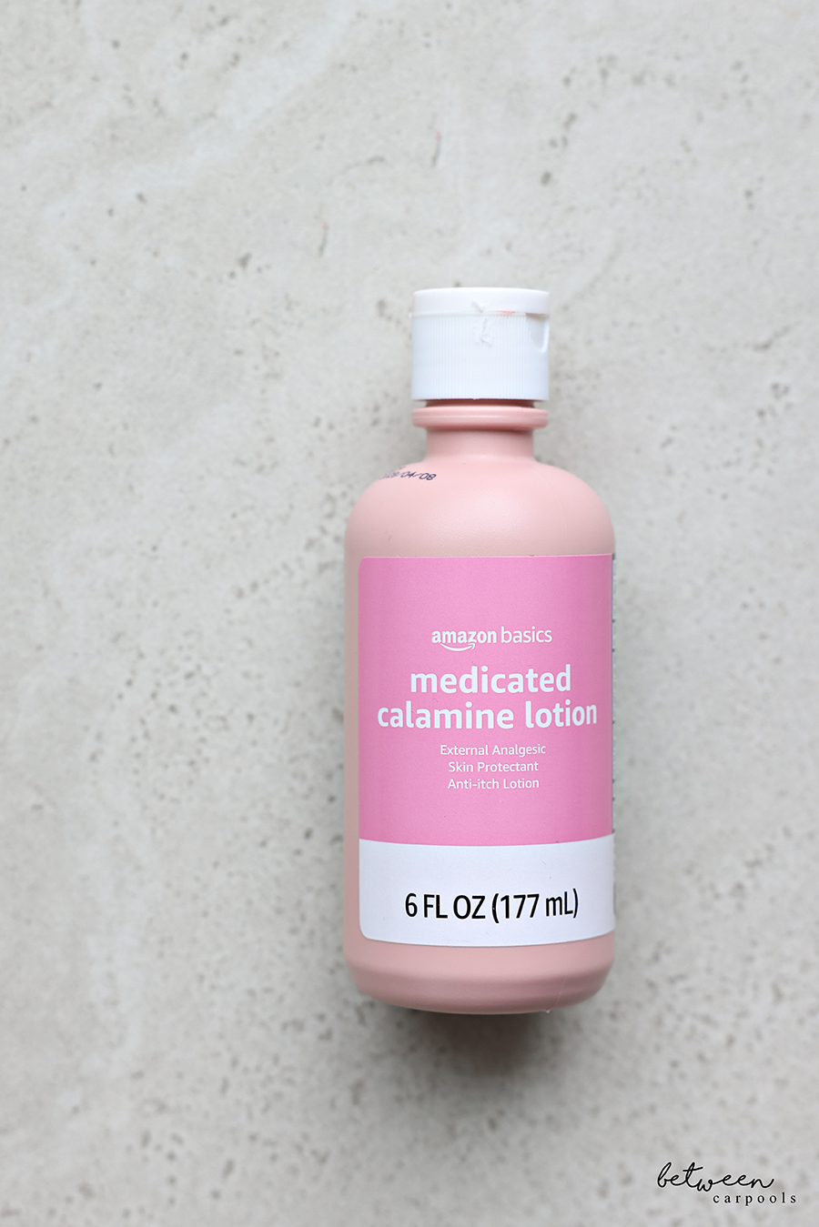 Bottle of amazon basics medicated calamine lotion.
